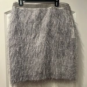 Custom made silver feather, satin and rhinestone skirt. Size 16